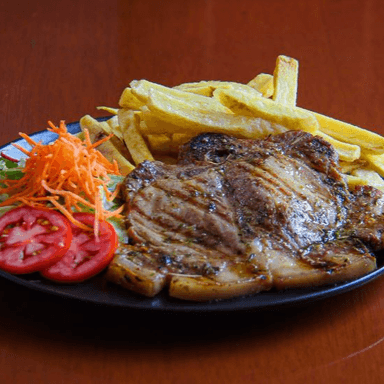 Chuleta Con Papas Fritas