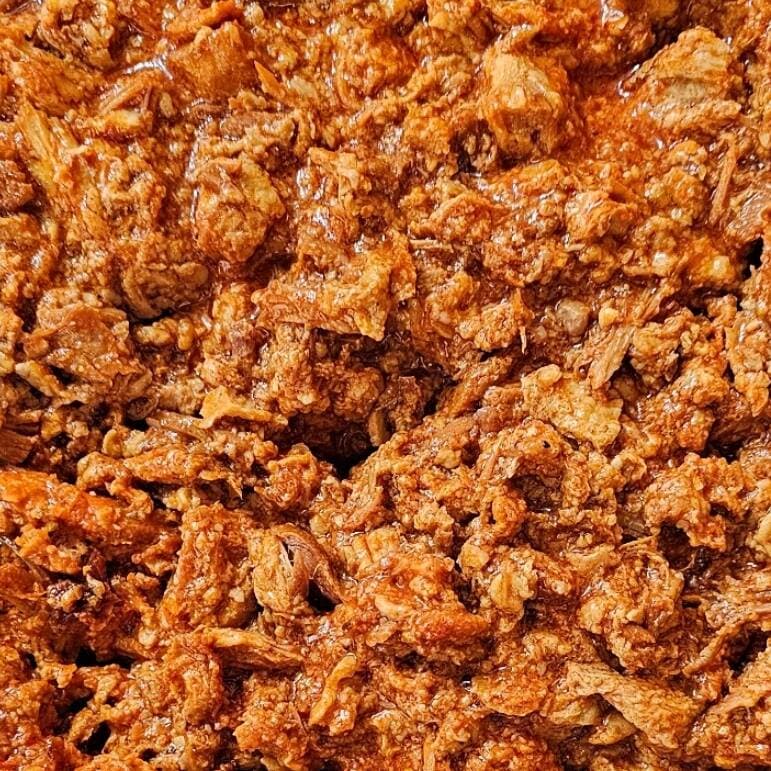 Burrito de Prensado en Salsa Roja