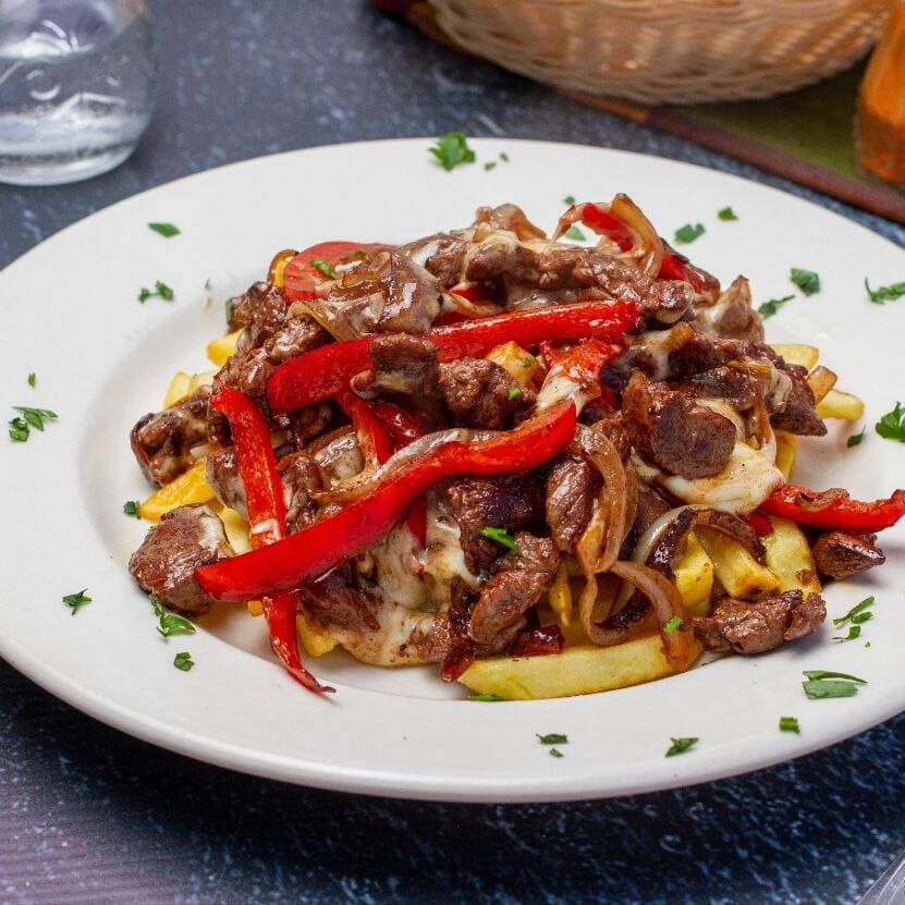 PARRILADA DE CARNE Y QUESO + COCA-COLA 250ML