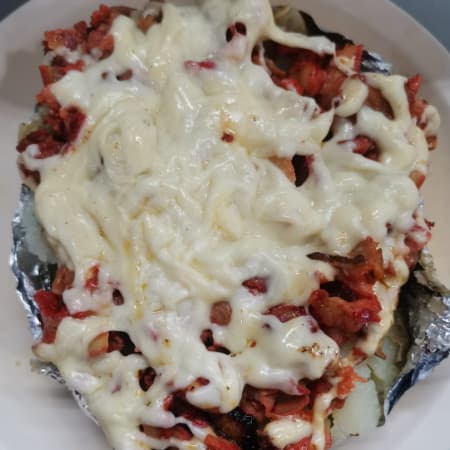 Papa con Pastor y Queso.