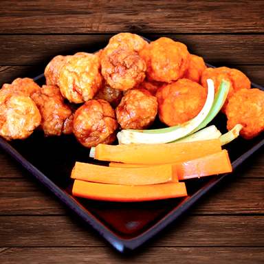 18 Boneless con papas cajun