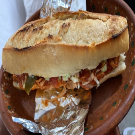 Lonche de Pierna*1+Coca Cola Lata de 355 Ml*1.