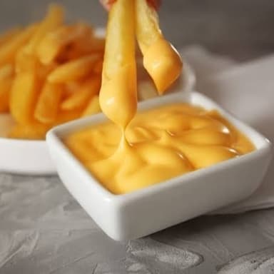 50g de queso cheddart liquido.