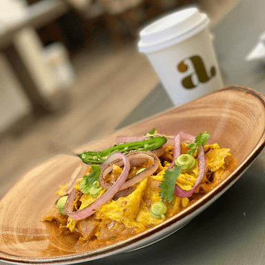Migas con Totopos y Pastor