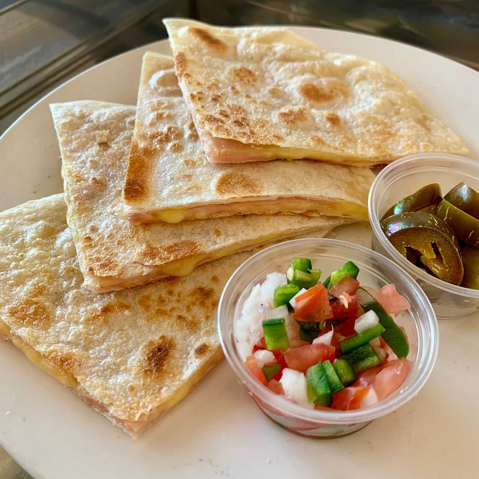 Sincronizadas con jamón y queso manchego gratinado
