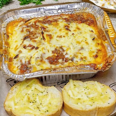 Lasagña Mixta Personal + Pan al Ajo