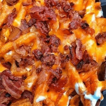 Papas Francesas con Qso Chedar y Tocino