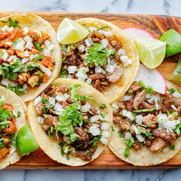 4 Tacos a elección + Refresco