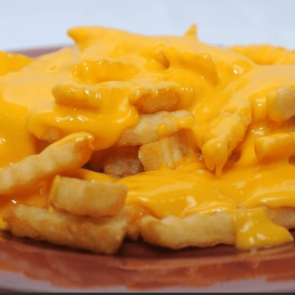 Papas Onduladas con Queso Chedar