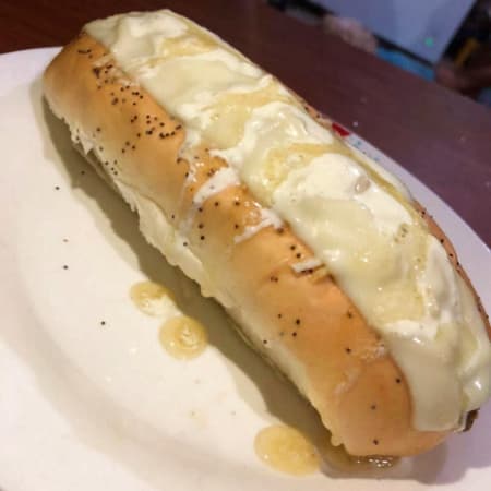 2 perros sencillos grandes + 2 gaseosas personales