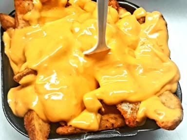 Orden de Papas Fritas en Gajos con Queso