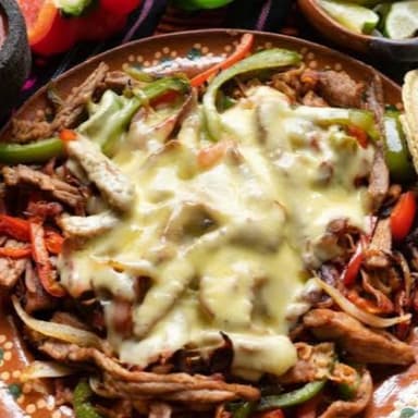 Alambre Bistec con Queso