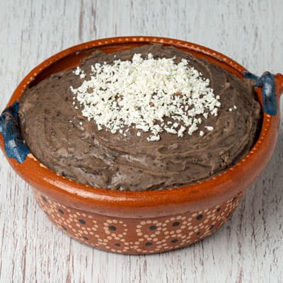 Frijoles negros refritos  1/2 kg
