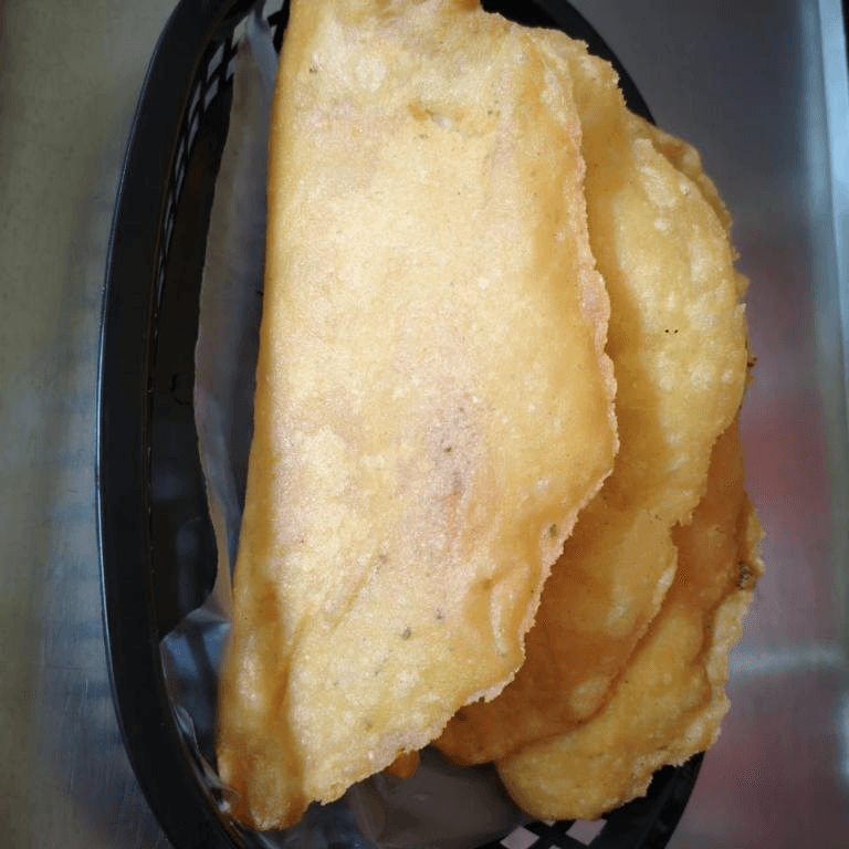 Empanadas de masa de maíz cascado