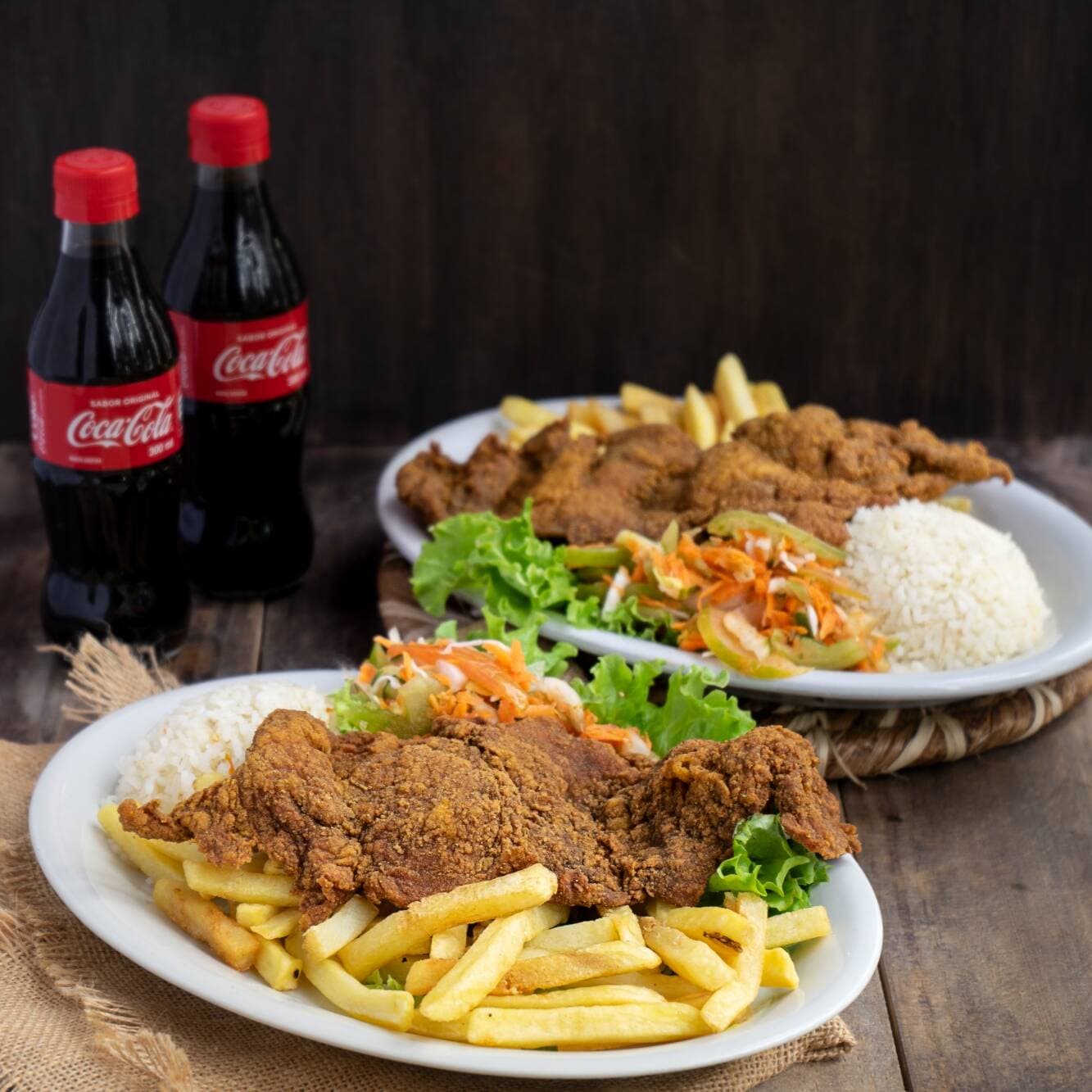 2 Combo Chuletas Vallunas Cerdo o Pollo y Cocacola