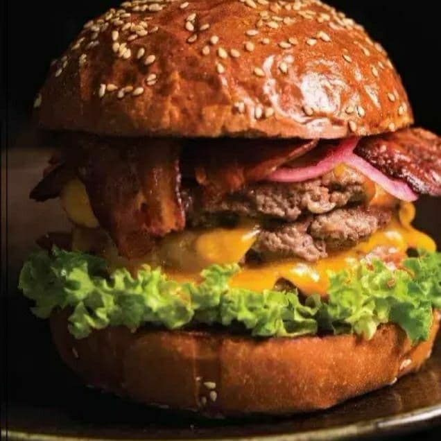 Hamburguesa  res con queso y tocino
