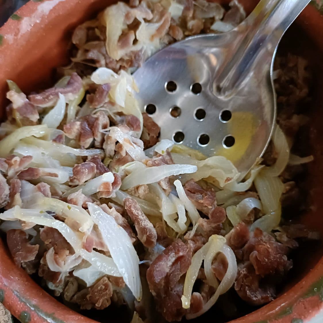 Taco de Tasajo Encebollado