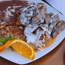 Chilaquiles con Rib Eyes 150 G
