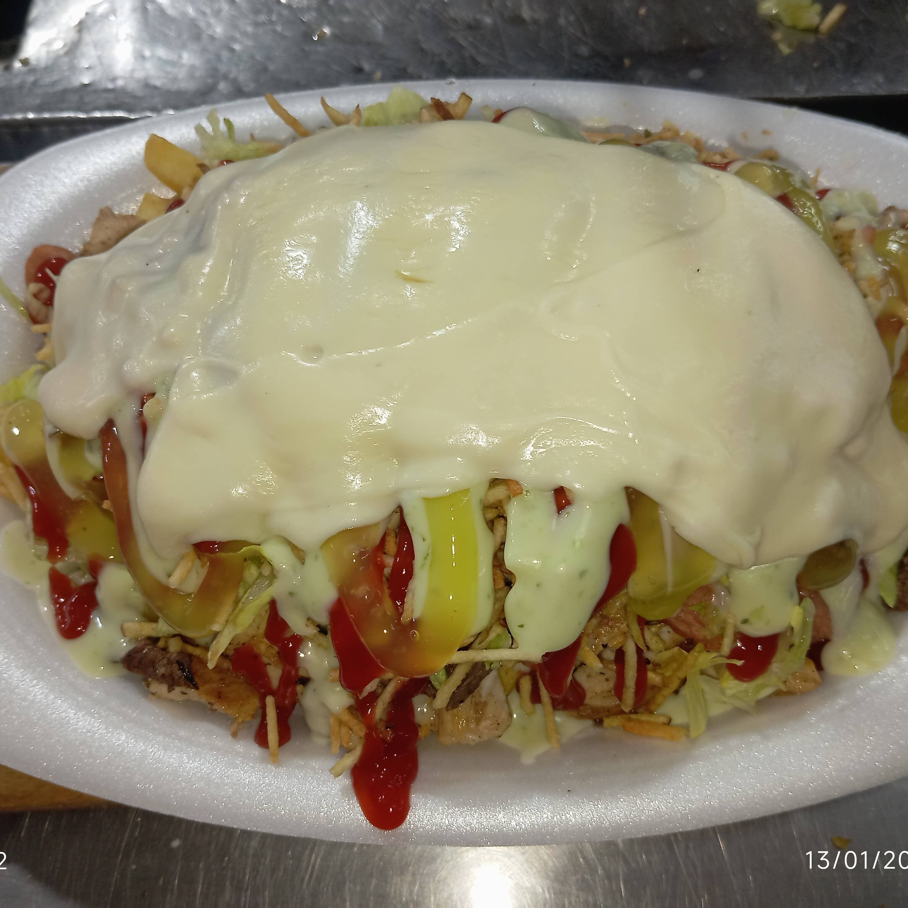 Salchipapa Mixta Carne y Pollo