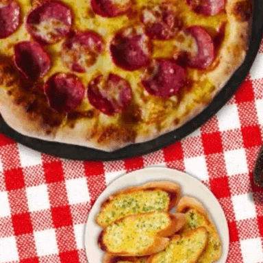 1 PIZZA FAMILIAR (8PORCIONES) + 3 PAN AL AJO