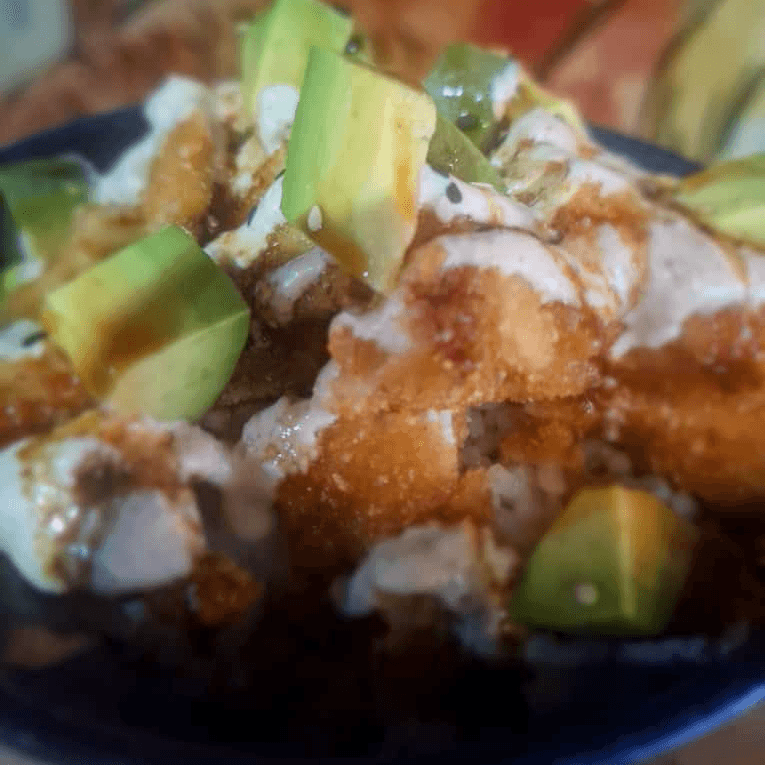 Arroz con pollo empanizado