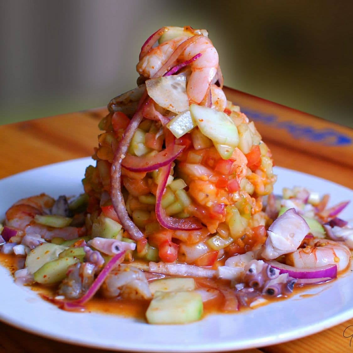 Tostada Embarazada = Ceviche de (mariscos mixtos)