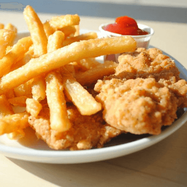 Trocitos de Pollo + Papas Fritas