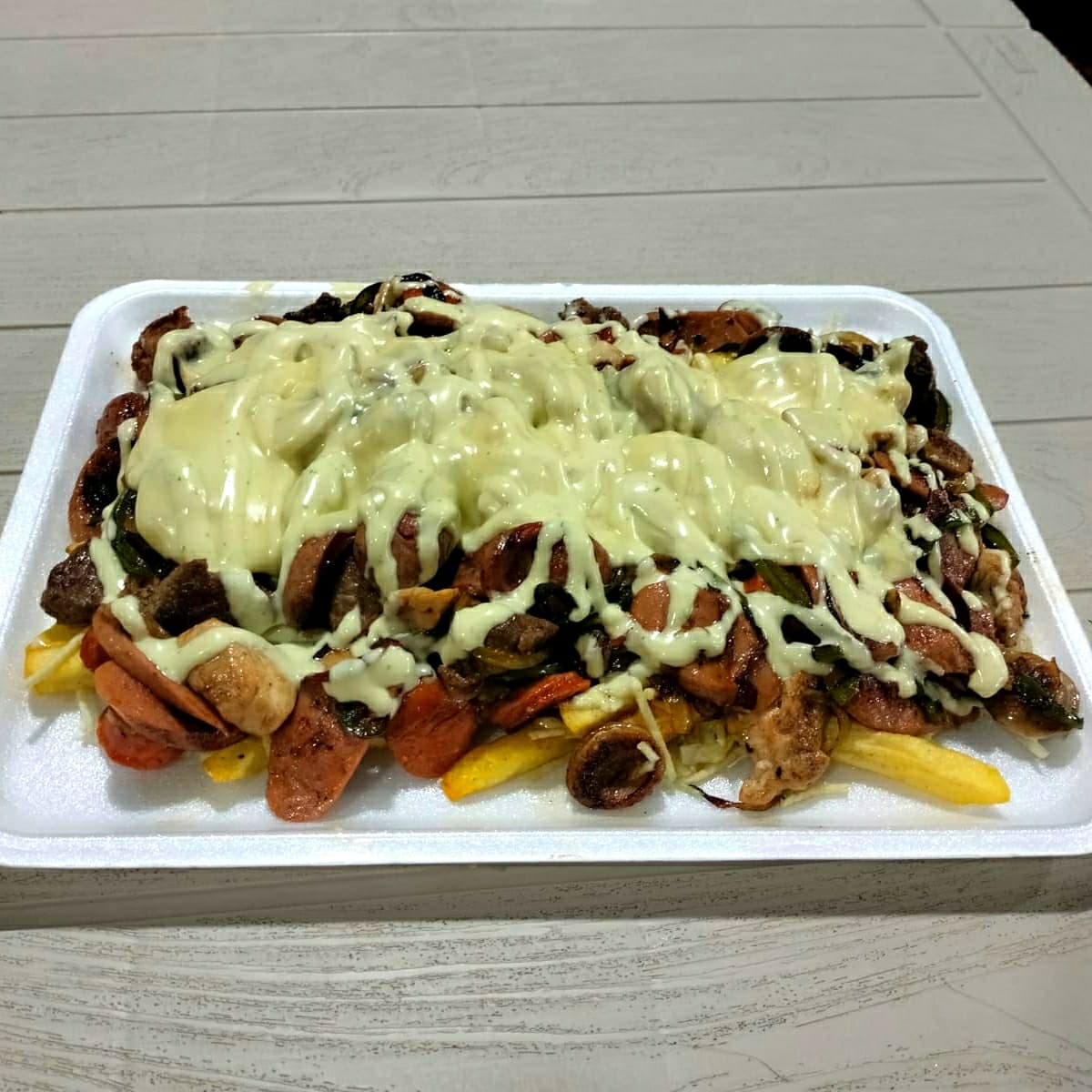 Salchipapa Especial J y J + Bebida