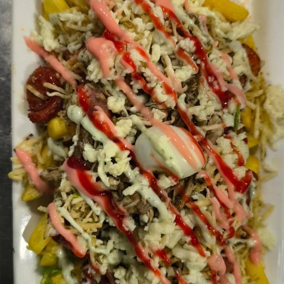 Salchipapa Fusión Tasty