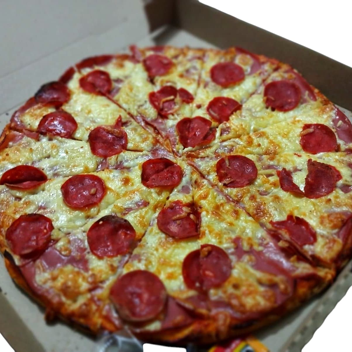 Pizza Pepperoni + Pan con Ajo