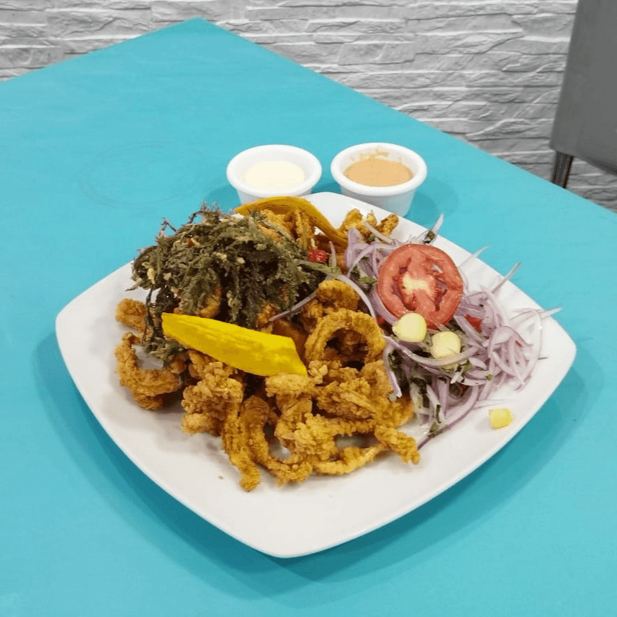 Chicharrón De Pota Con Yuca