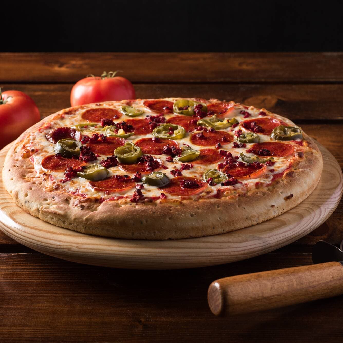Pizza Mediana del Barrio.