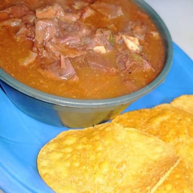 Arroz con Carne en Salsa.