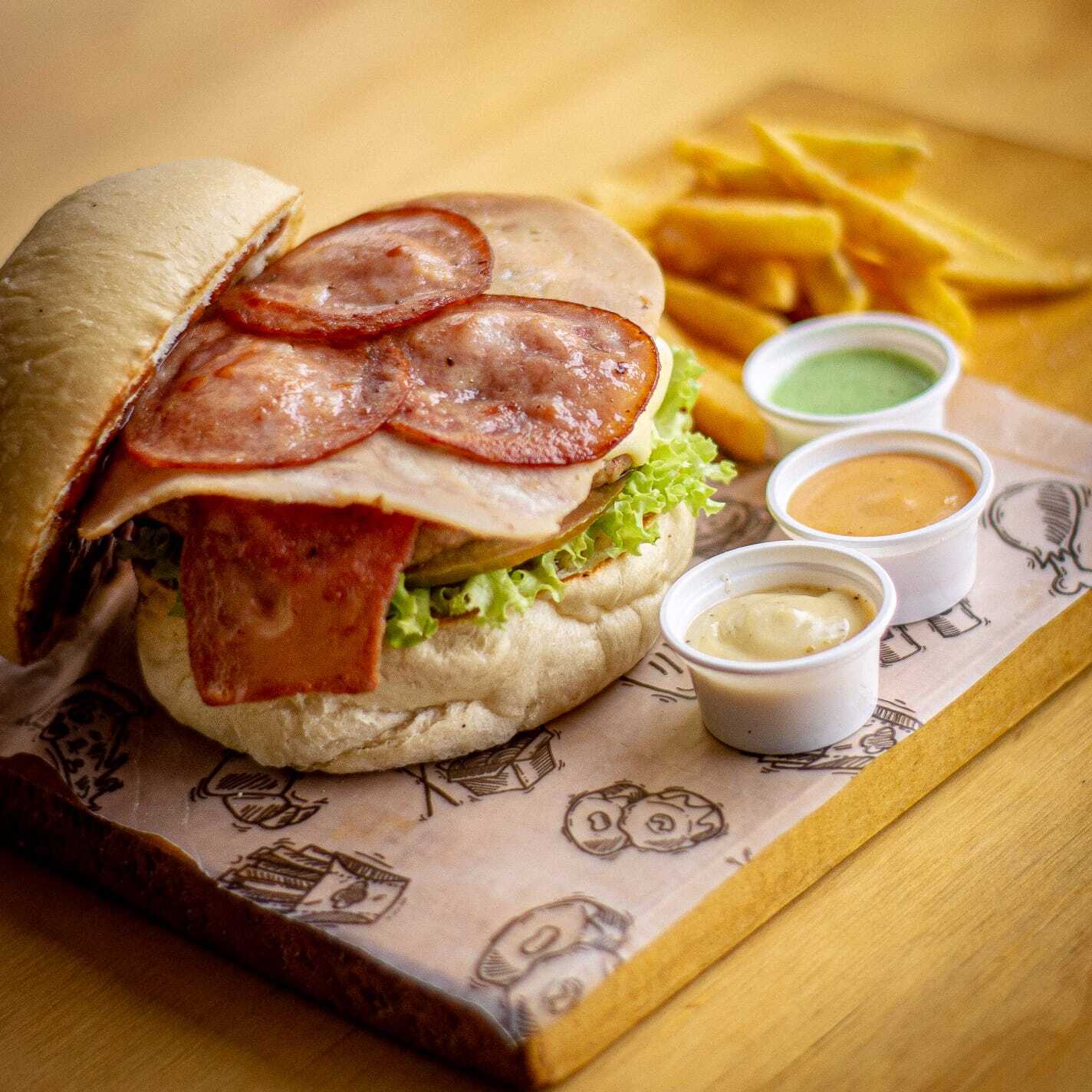 Hamburguesa Suprema + Porcion de Papas