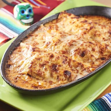 Combo: Enchilada Desmenuzada o Salteada de Pollo + Coca Cola sin