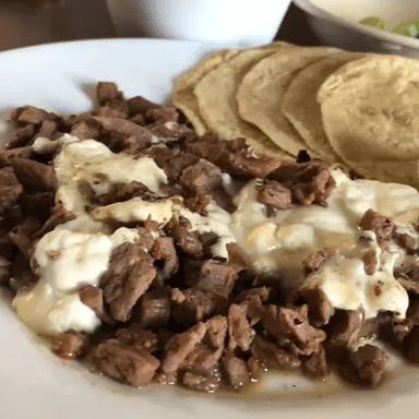 Bistec con queso