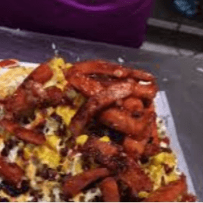 salchipapas especial + lomo de cerdo asado