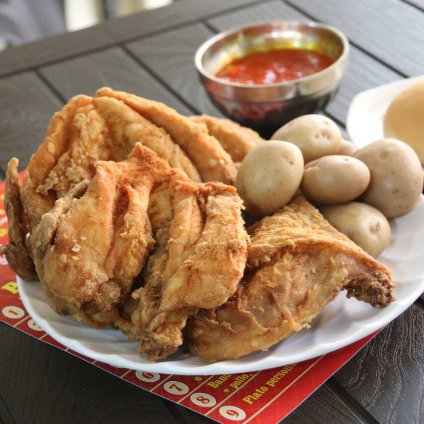 Medio pollo apanado