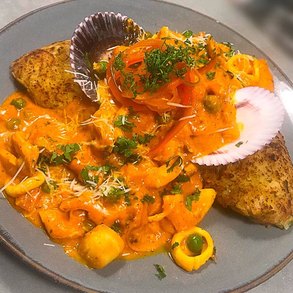 Tacu Tacu en Salsa de Mariscos