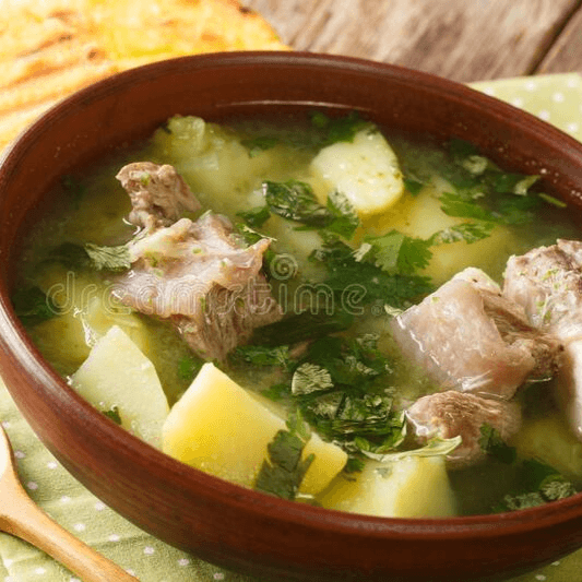 Caldo de Costilla Con Arroz y Arepitas