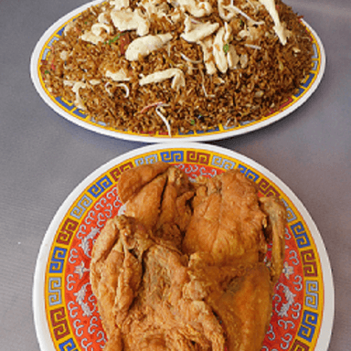 1 Caja Grande de Arroz mas 1/2 Pollo Apanado