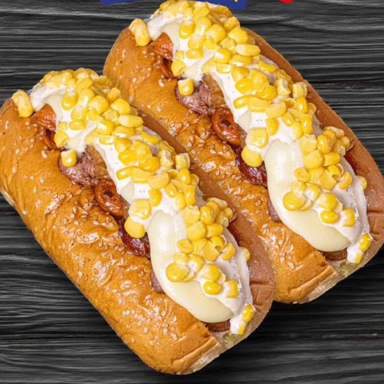 2 Perros Especiales + Papas Fritas + 2 Gaseosas
