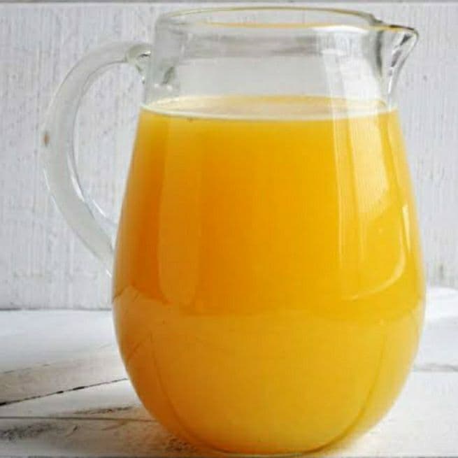 AGUA DE Tang de naranjas