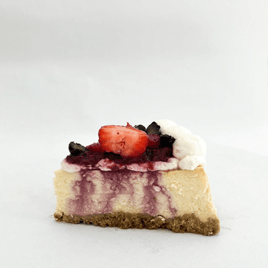 REBANADA DE CHEESECAKE DE FRUTOS ROJOS