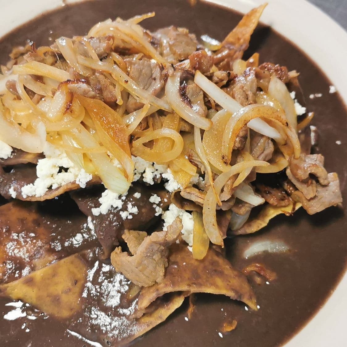 Enfrijoladas con Tasajo