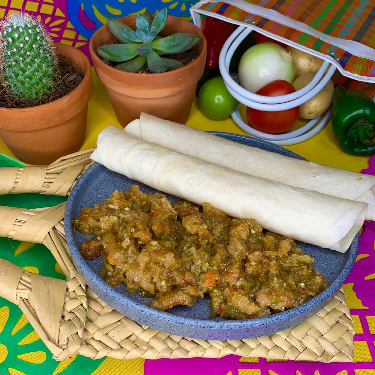 Burrito yesca en salsa verde