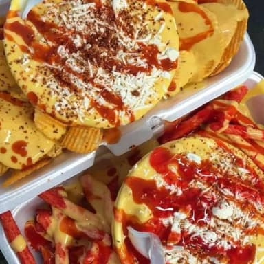 Elote chorreado y bebida.