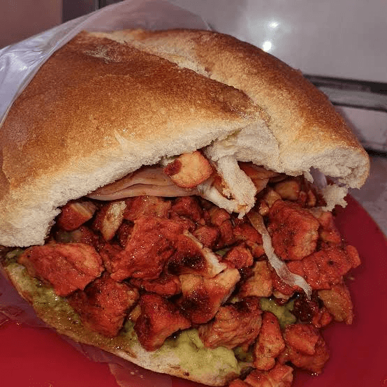 Combo Torta de Pastor + Agua del Día Medio Litro