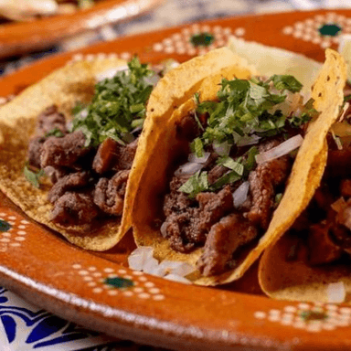 Tacos de Pollo o Lomito