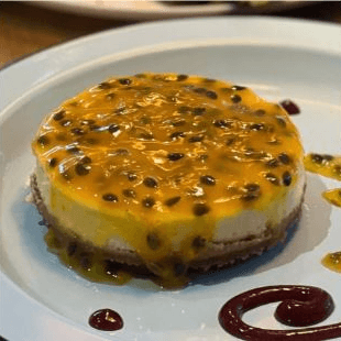 Cheesecake con Coulis de Maracuya